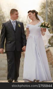 Newly-married couple. Pair young men in wedding day