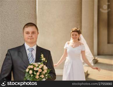 Newly-married couple. Pair young men in wedding day