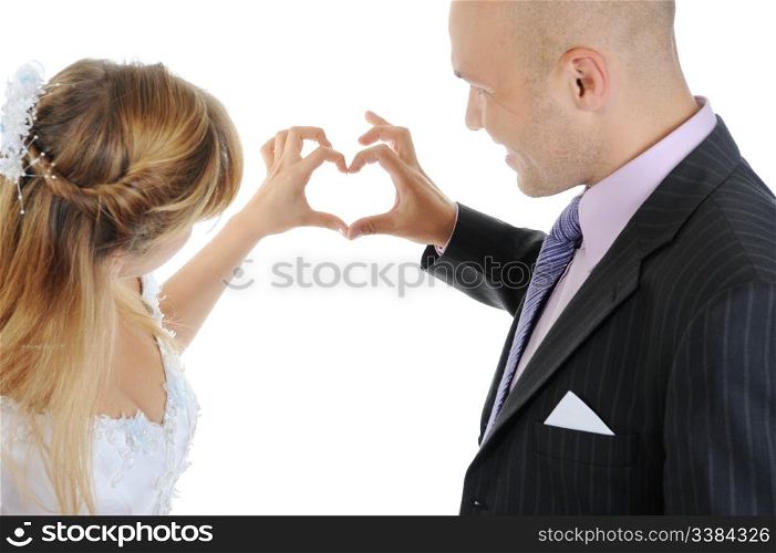 Newlyweds make heart fingers. Isolated on white