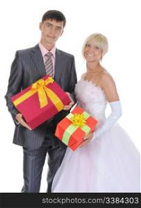 Newlyweds with gift boxes in their hands. Isolated on white background