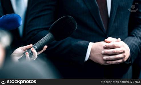 News reporters interviewing a politician.