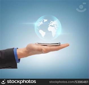 news, technology and environment concept - man hand with sphere globe