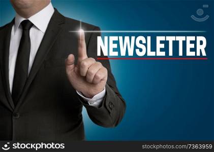 Newsletter touchscreen is operated by businessman.. Newsletter touchscreen is operated by businessman