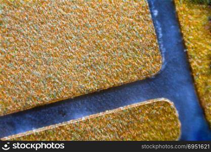 NFC chip under the microscope. Closeup macro photography.
