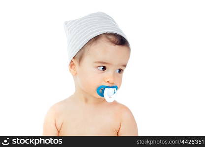 Nice baby with grey cap and pacifier isolated on a white background