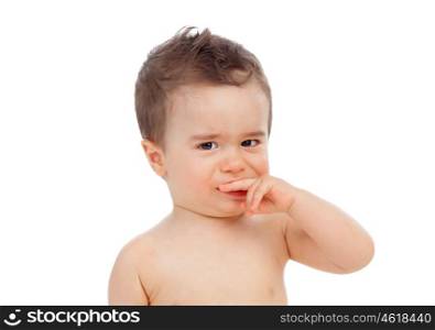 Nice baby with sore gums isolated on a white background