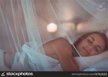 Nice Calm Woman Sleeping at Home in her Bed. Sweet Dreams. Night Time for Relaxation and Reset. Woman in Deep Sleep