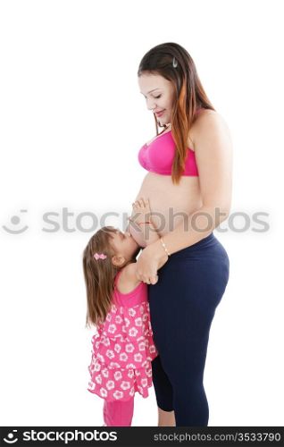 Nice Caucasian woman pregnant with her daughter on the background