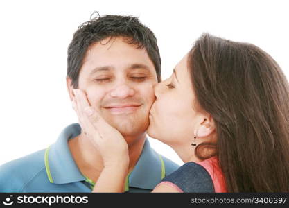 Nice girl kisses the young modest guy on a cheek