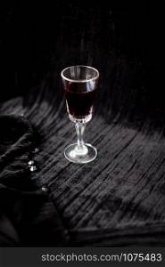nice glass of red wine on a black background Velvet.. nice glass of red wine on a black background Velvet