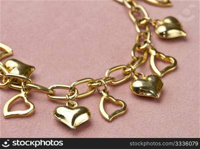 Nice golden bracelet in heart shape