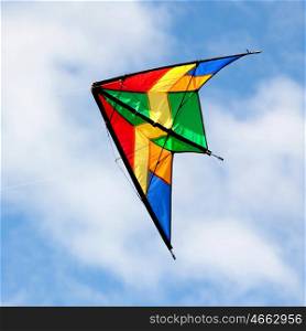 Nice kite flying on a over blue sky