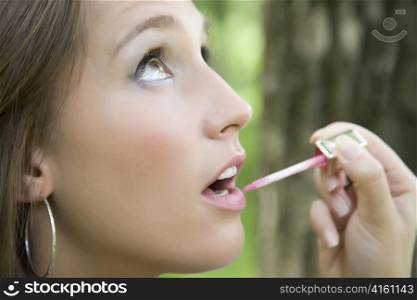 Nice Model With Lipstick On The Nature Background