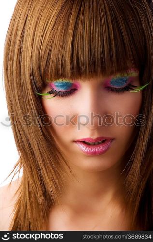 nice of young beautiful girl with colored make up and green long eyelashes