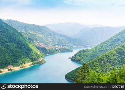 Nice panorama view blue sea between mountains. Pivsko Jezero, Montenegro