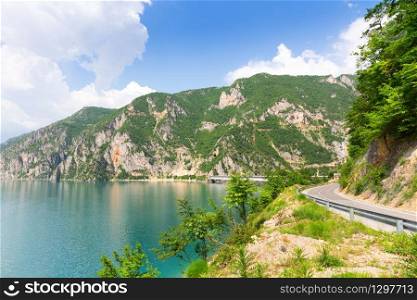 Nice panorama view of blue sea, mountains and road