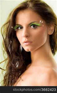 nice portrait of a cute girl with long hair and green eyelashes