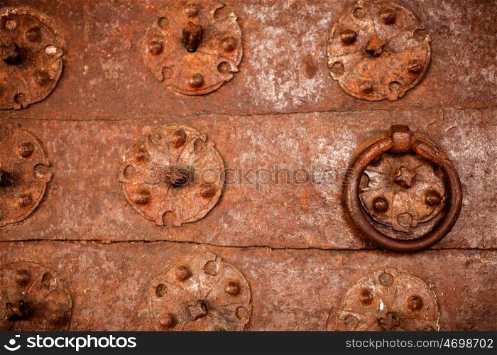 Nice rusty iron door with nice decoration