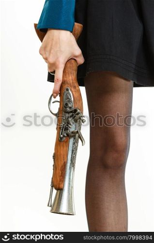 Nice steampunk islolated girl legs on white. Fantasy old fashion with gun directed to ground.