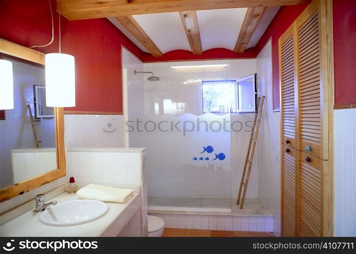Nice warm white bathroom, red walls natural light interior
