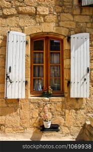 nice window in domme, perigord noir, aquitaine, france