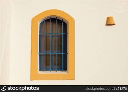 Nice windows on facade Mediterranean house in Spain