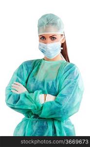 nice woman in green surgery dress with cap mask and gloves looking in camera