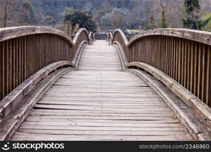 Nice wooden bridge with arcs