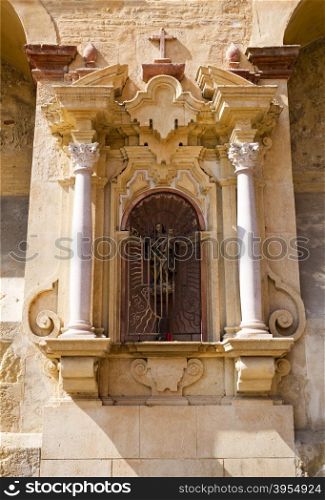 Niche to the Virgin Mary on an outside wall of the Cathedral of Cordoba, Spain