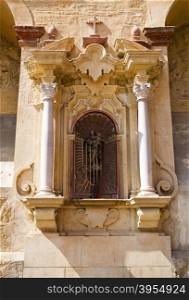 Niche to the Virgin Mary on an outside wall of the Cathedral of Cordoba, Spain