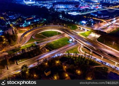 Night Aerial view of a freeway intersection traffic trails in night Moscow