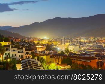 Night aerial view of Tossa de Mar on the Costa Brava.. Tossa de Mar in night illumination.