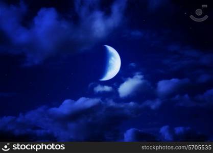 night beautiful blue sky with cumulus clouds, moon and stars