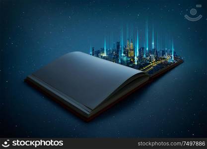 Night beautiful scene of modern city skyline pop up in the open book pages with smart big data wireless connections iot automation system .