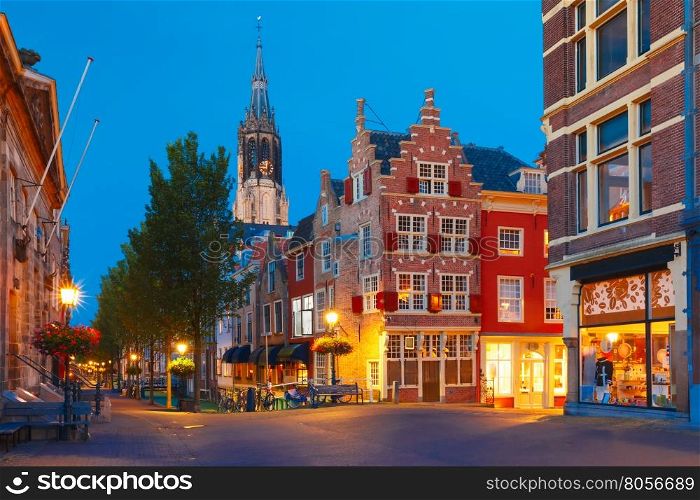 Night canal, typical dutch house and Gothic Protestant Nieuwe Kerk, New church, in Delft, Holland, Netherlands