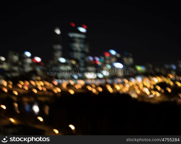 Night city life. Blurred bokeh lights of night big city