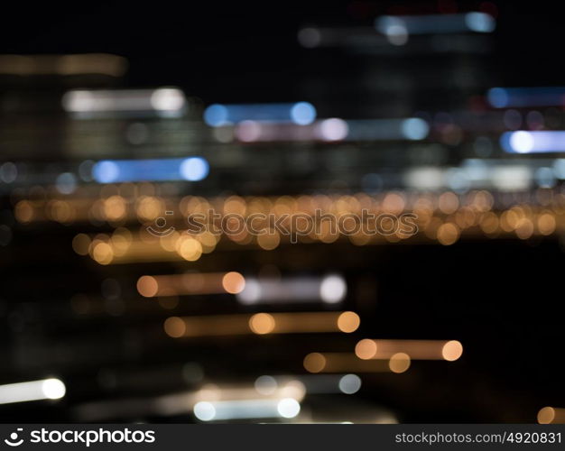 Night city life. Blurred bokeh lights of night big city