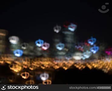 Night city life. Blurred bokeh lights of night big city