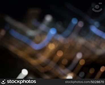 Night city life. Blurred bokeh lights of night big city