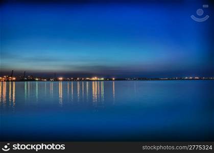 Night coastline, view from the pier of Odessa Sea Port. Ukraine.