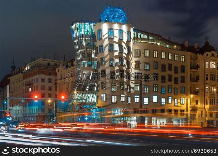 Night dancing house in Prague, Czech Republic. Prague, Czech Republic - December 23, 2015: The famous dancing house, also called Ginger nad Fred, at night in Prague, Czech Republic
