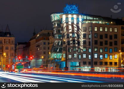 Night dancing house in Prague, Czech Republic. Prague, Czech Republic - December 23, 2015: The famous dancing house, also called Ginger nad Fred, at night in Prague, Czech Republic