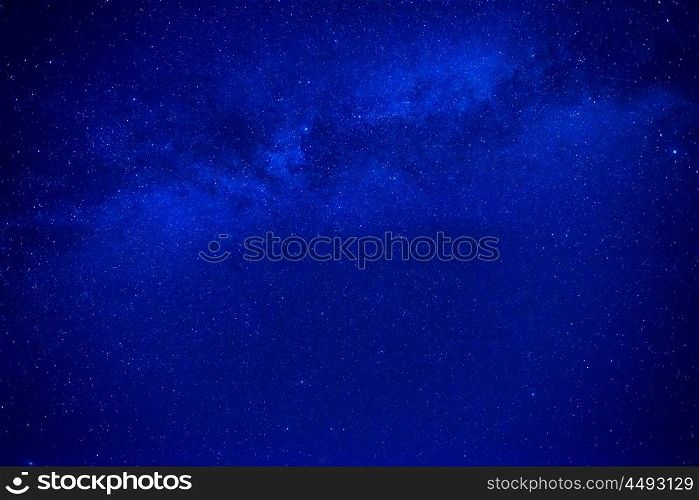 Night dark blue sky with many stars and milky way galaxy