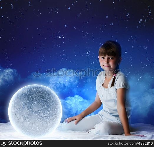Night dreaming. Cute girl sitting in bed with moon