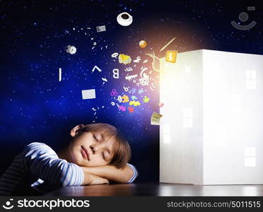 Night dreaming. Cute little boy sleeping and dreaming about home