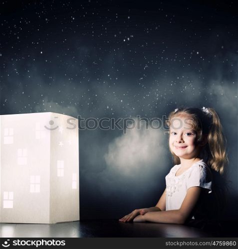 Night dreaming. Little cute girl in darkness dreaming about home and family