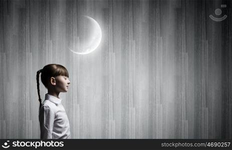 Night dreaming. Side view of cute girl with closed eyes
