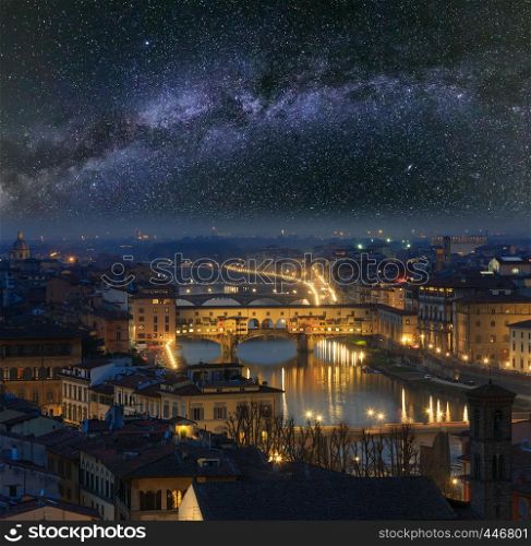 Night Florence City top view (Italy, Tuscany) on Arno river with starry Milky Way in sky