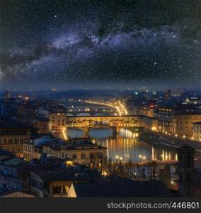 Night Florence City top view (Italy, Tuscany) on Arno river with starry Milky Way in sky