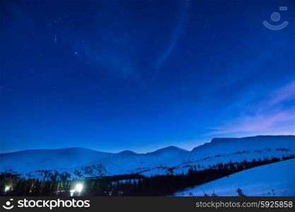 Night in the mountains under bright shining stars
